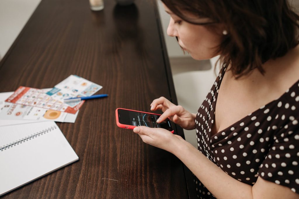 A Woman Holding a Smartphone